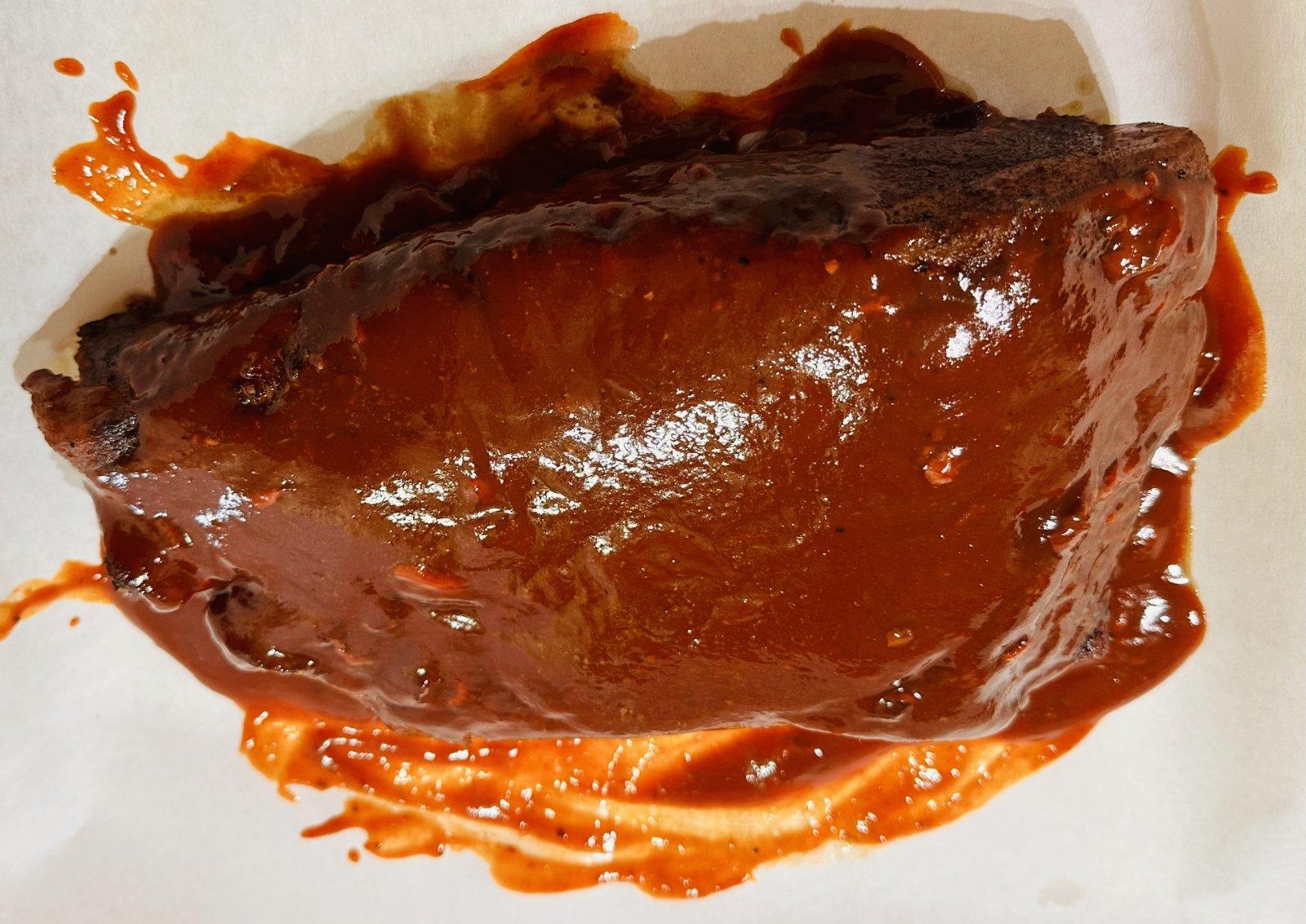 6 Brisket with truffle infused hot sauce and Chipotle BBQ sauce.jpg
