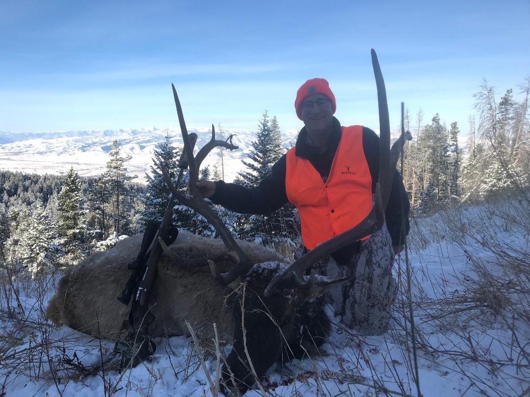 elk with rifle.jpg